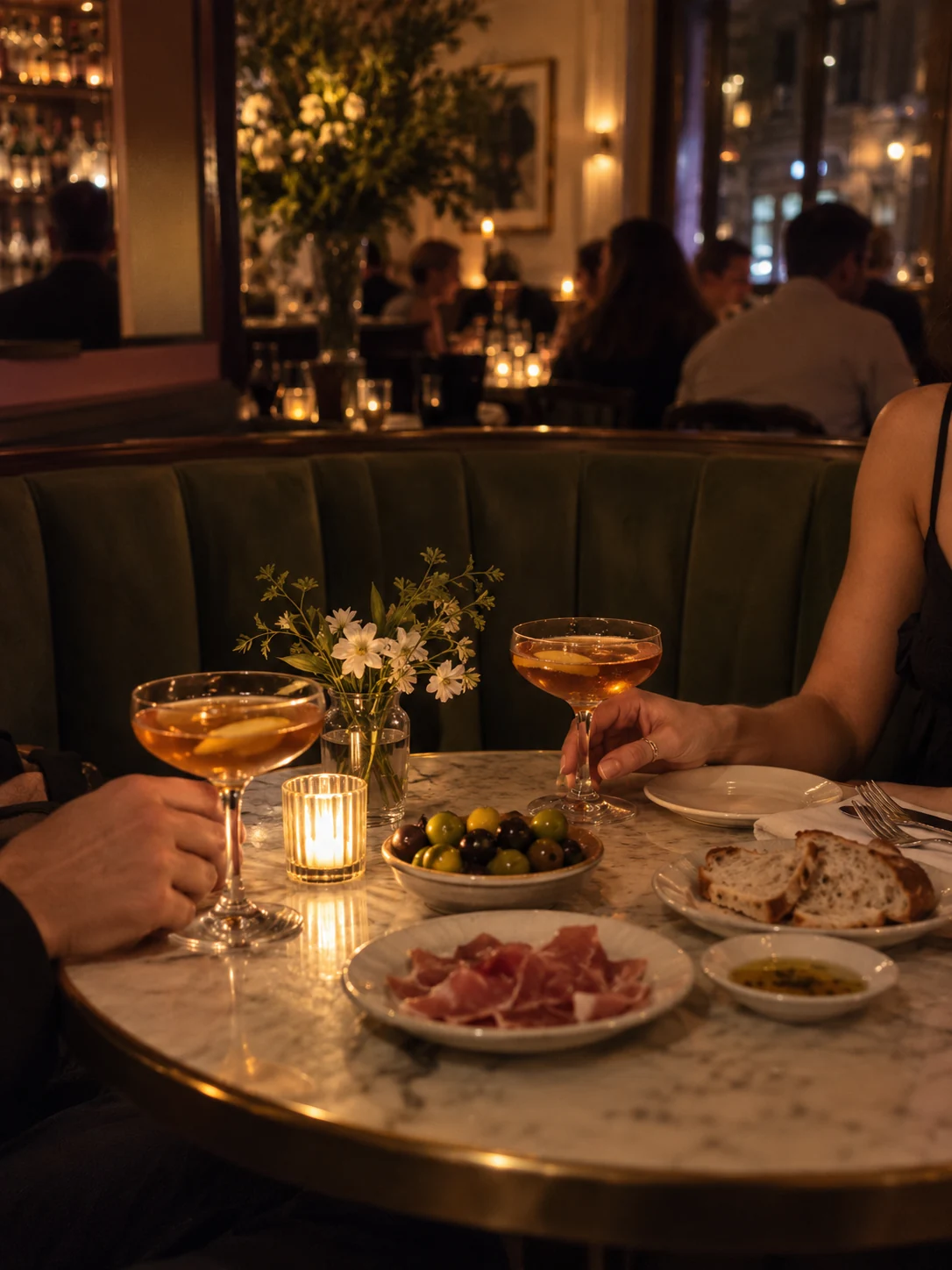 Candlelight and shared plates at an intimate bistro